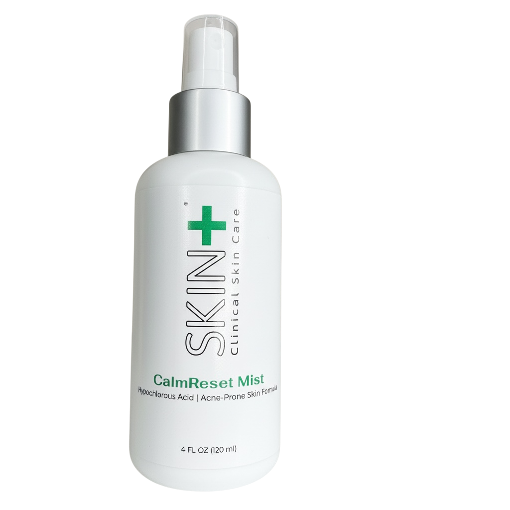 White spray bottle labeled 'SKIN Clinical Skin Care CalmReset Mist' on a white background