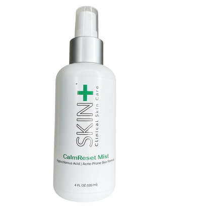White spray bottle labeled 'SKIN Clinical Skin Care CalmReset Mist' on a white background
